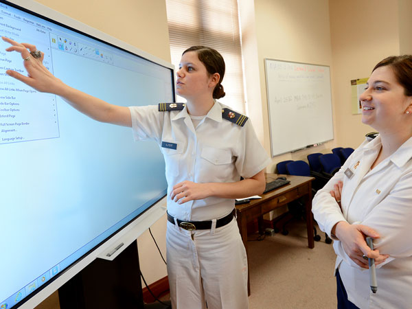 Image of Capt. Kristi Brown with cadet at smartboard