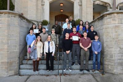 Cyber Fusion participants pose with VMI staff on the steps of Moody Hall.