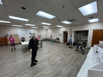 VMI cadet supervises as participants utilize VR equipment.