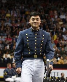 Jimmy Murphy walks back to his seat after collecting his VMI diploma at commencement.