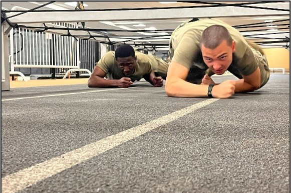 Air Force ROTC cadets participate in a physical challenge.