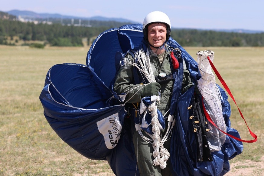 VMI Air Force ROTC cadet smiles after a safe landing in the freefall program.