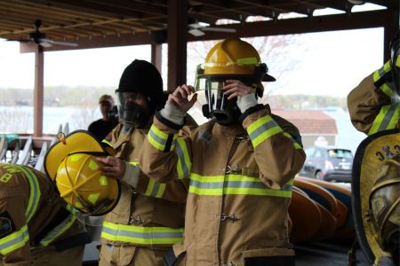 Navy ROTC cadets train with firefighting equipment at Smith Mountain Lake.
