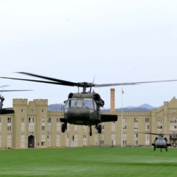Helicopters over parade ground.