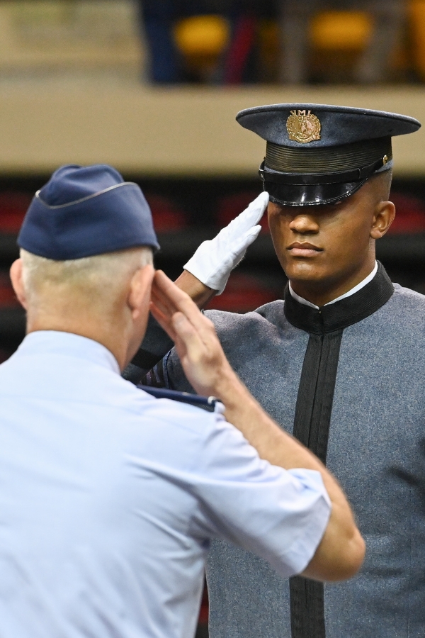The Regimental Commander of the Corps salutes VMI's Commandant of Cadets during Matriculation.