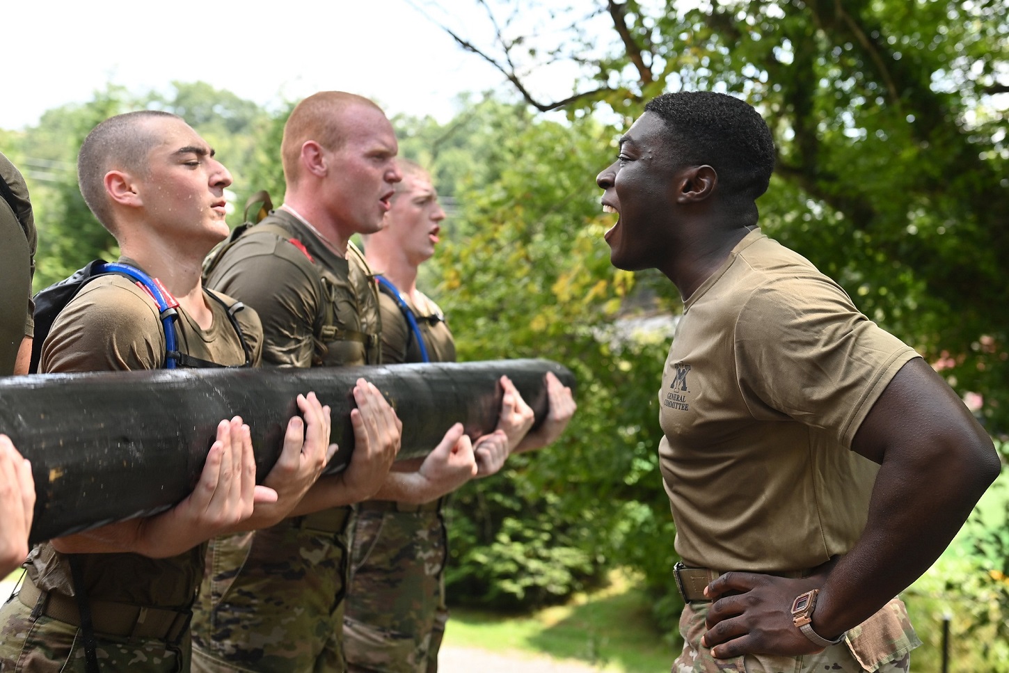Upper-class cadet leads rats - VMI freshmen - in physical training during the Rat Crucible.