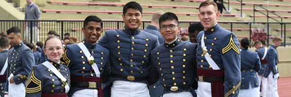 Graduating students, members of the Corps of Cadets at VMI, a military college in Lexington, VA, pose in Foster Stadium as they prepare to transition from cadet to alumnus.