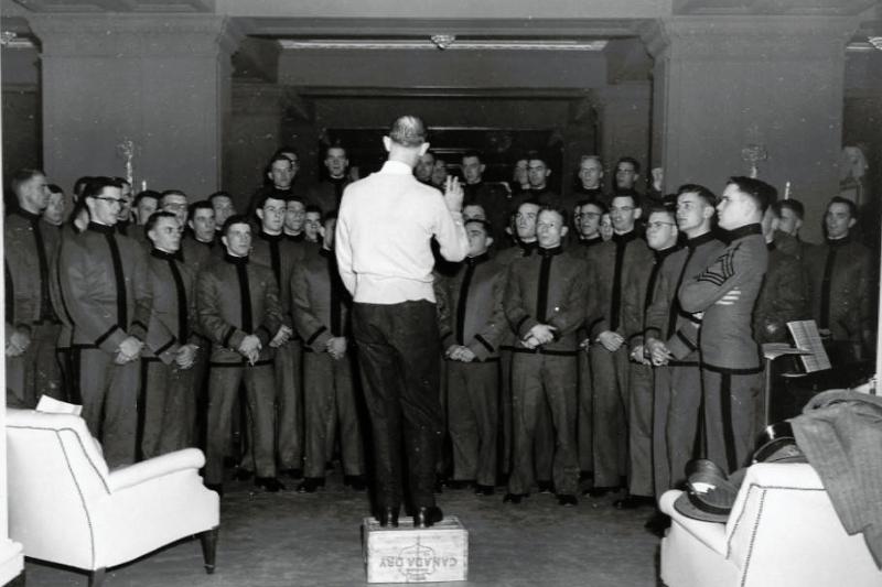 Herbert N. Dillard rehearses with the VMI Glee Club in Washington, D.C. before their Presidential Concert, 1955. VMI Archives