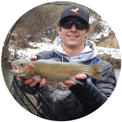 Fishing Club cadet holding fish photo circle