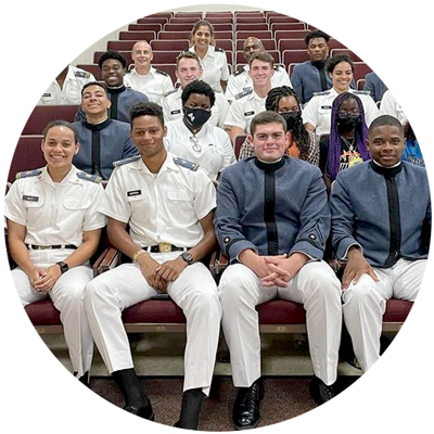 Promaji Club cadet members sitting in auditorium photo circle