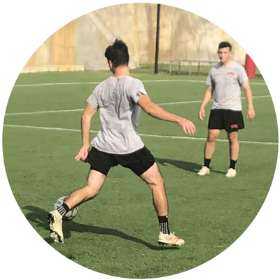 Soccer Club team members playing soccer on field photo circle