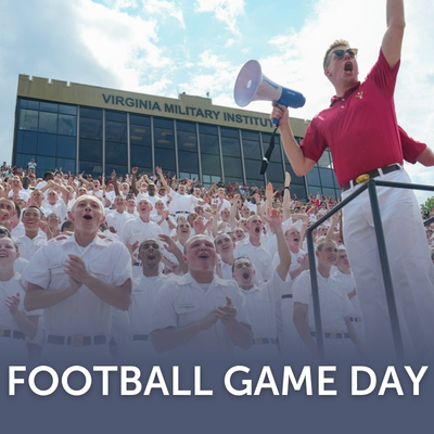 Cadets are led by an upperclassman in cheering for the VMI Keydets football team in Foster Stadium.