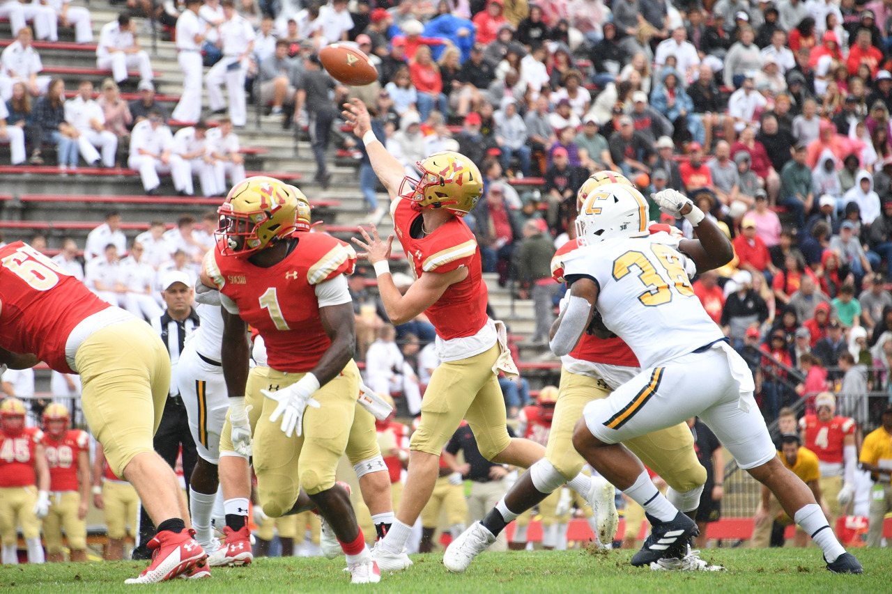 VMI quarterback throwing ball