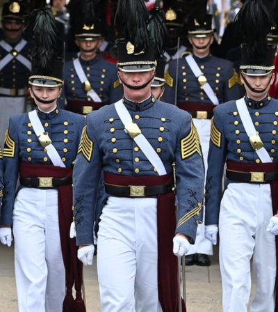 Brian Pritchard pauses for a photo after collecting his diploma in Cameron Hall.