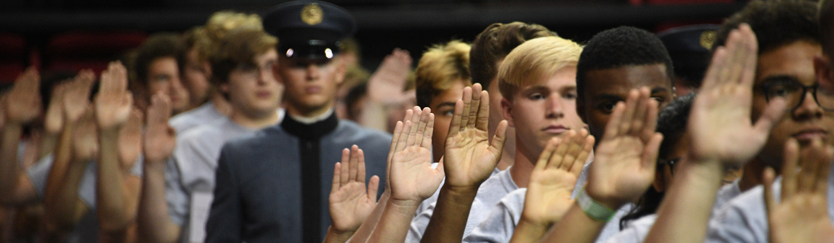 Incoming VMI cadets raising hands for new cadet oath during matriculation