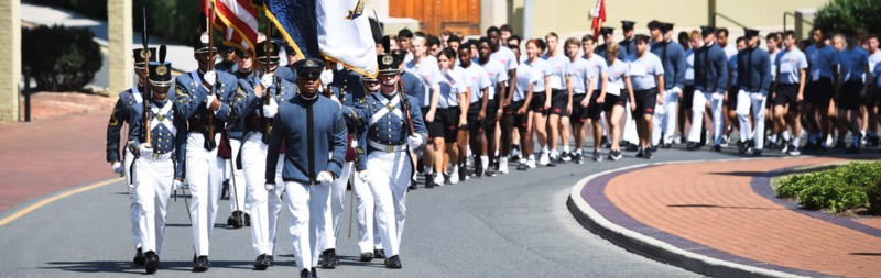 Corps leaders march the newest rats, VMI freshman, up Letcher Ave to barracks on Matriculation Day.