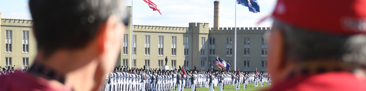 Visitors to post look on during a parade.