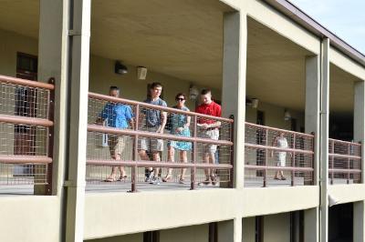 Prospective cadets walk through barracks during STP