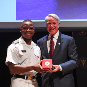 Kirk Lippold with Brandon Marks posing with CLE Compass