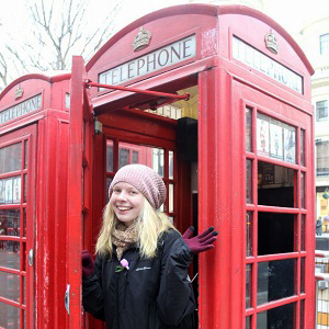 Photograph of Cadet Foster in London phone booth 