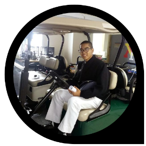 Photo of Binh Tran '23 in golf cart