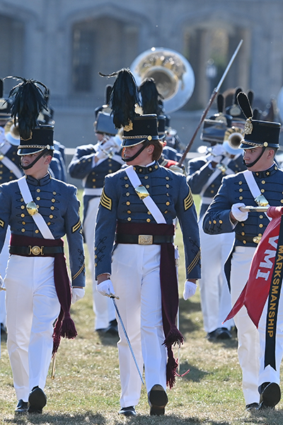 Julia Ward leads Band Company during a parade.