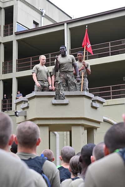 Maximus Ankrah addressed the Rat Mass from atop the Sentinel Box.