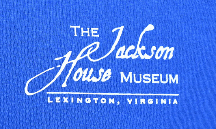 close up of Jackson House Museum logo in white