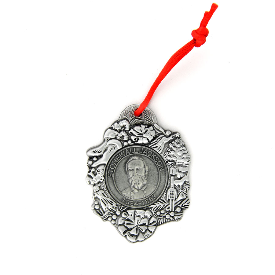 Pewter ornament with Stonewall Jackson's portrait on a center circle surrounded by a garland of Christmas objects