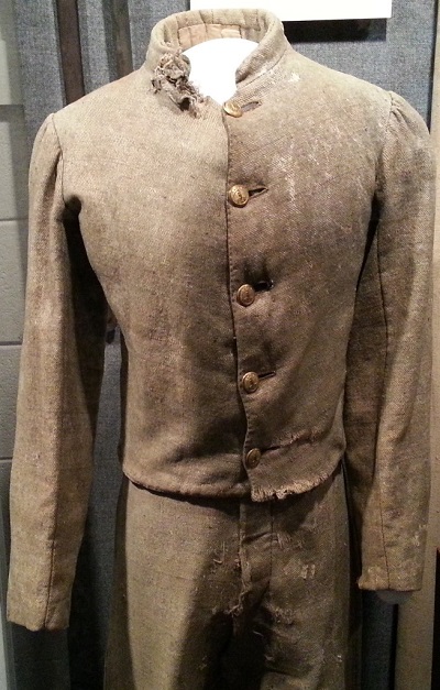 Photo of Cadet Smith's uniform depicting bullet damage.