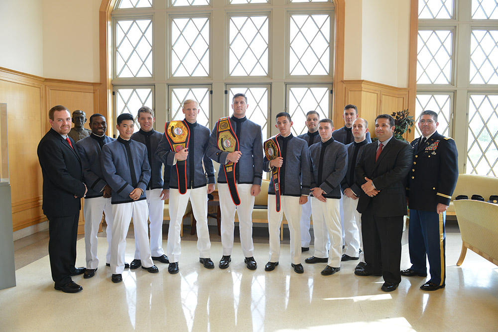 Members of the VMI club boxing team display their belts.