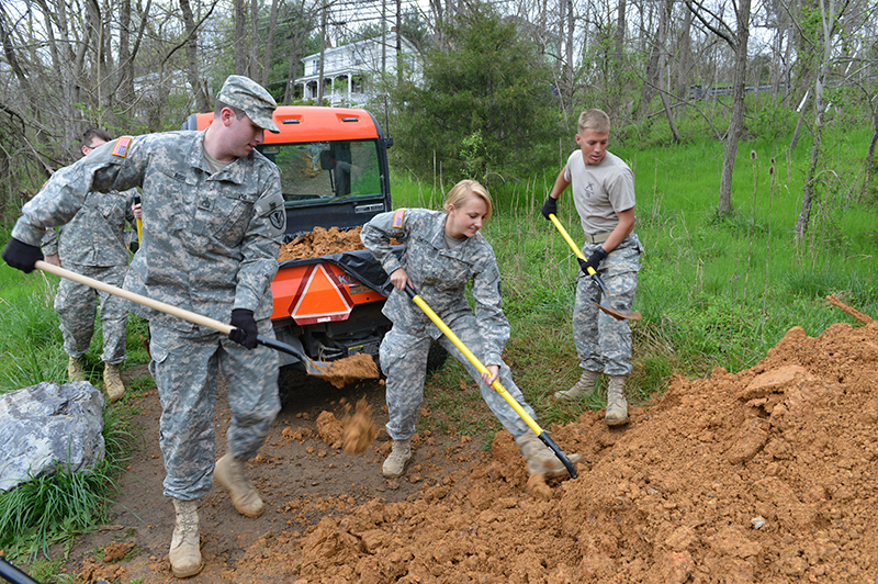 Cadets shoveling dirt