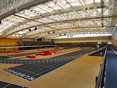 Among the features of the Corps Physical Training Facility are a 200-meter hydraulic track, overhead obstacles, a rock wall, a warmup track, and spectator seating. – VMI Photo by John Robertson IV.