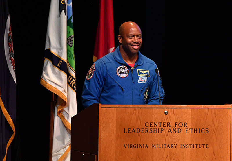 Astronaut Leland Melvin speaks from the podium in Gillis Theatre.