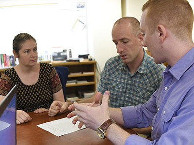 Maj. Jessica Libertini and Lt. Col. Paul Moosman '98 with Ross Schmeisser '18.