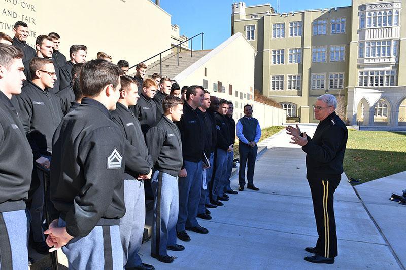 Gen. J.H. Binford Peay congratulates the rugby team in Memorial Garden.