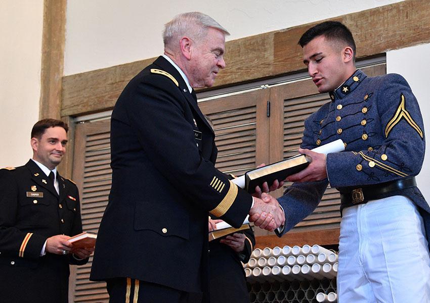 Richard Dow '18 crosses the stage today in the graduation ceremony held in Jackson Memorial Hall. Visit flickr.com/vmiphotos to see more images from December graduation. – VMI Photo by H. Lockwood McLaughlin.