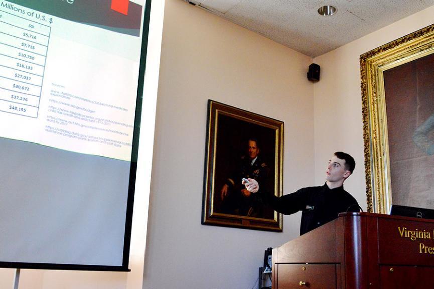 John O'Donnell presents his research in the Turman Room of Preston Library.