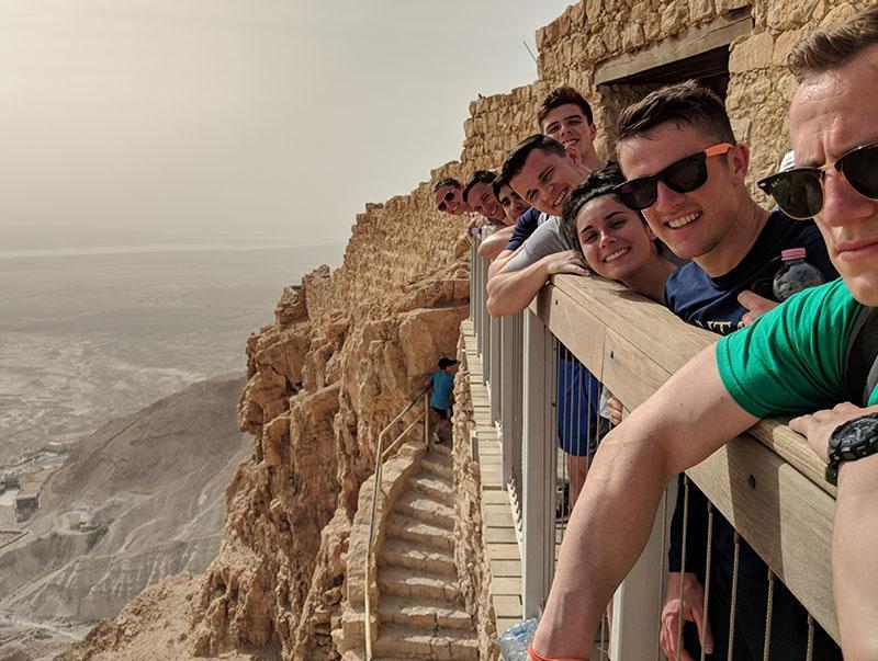 Cadets take in the view from Masada, an ancient fortress in the Judean Desert of Israel, during the Olmsted sponsored trip over Spring Furlough.