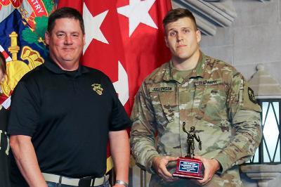 Adam Josephson '19 receives the Tom Surdyke award from Tom Surdyke's father, Tim Surdyke.—Photo courtesy of the U.S. Military Academy.