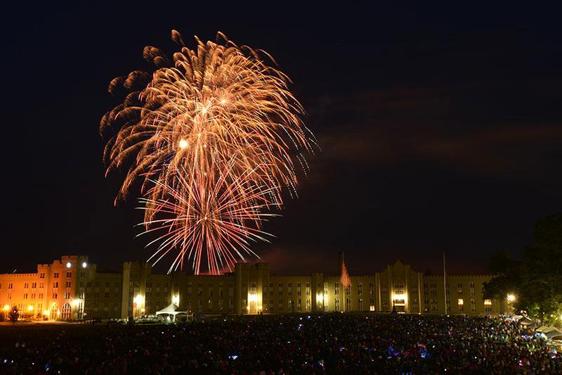 Fireworks fill the sky on July 4 as visitors watch from the Parade Ground.