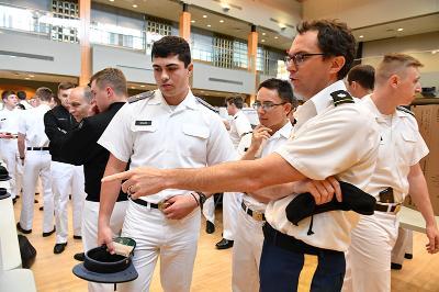 Rob Soluri ’22 talks with Lt. Col. Brent Hierman, associate professor of international studies, about his research on gun control and violent crime rates.—VMI Photo by Kelly Nye.