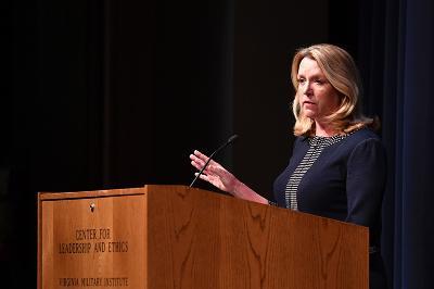 Former Air Force Secretary Deborah James stands at the podium in Gillis Theater.