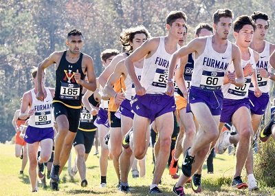 Cadet Shabaz '21, in black, running at Southern Conference Cross Country Championship