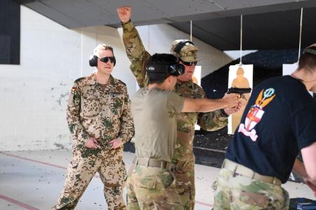 Cadets and instructors at firing range
