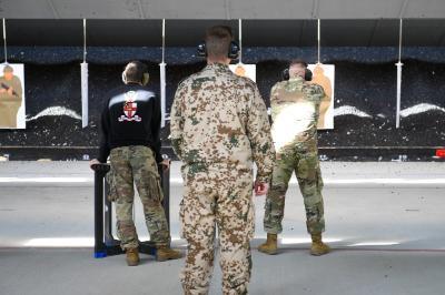 Cadets and instructors at firing range