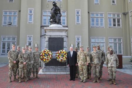 AFROTC Det. 880 cadets with Gen. Jumper '66 at 9/11 ceremony next to wreaths at Virginia Mourning Her Dead statue at VMI. - VMI Photo by Kelly Nye