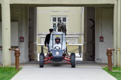 VMI cadet drives vehicle built for Baja SAE competition.