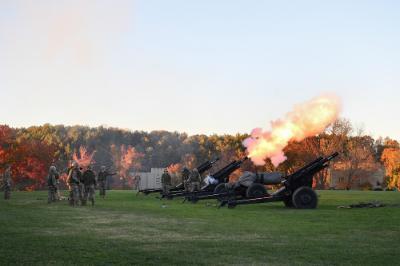 Members of the VMI Cadet Battery fire M2A1 (later M101A1) 105mm howitzers in preparation for Founders Day.—VMI Photo by Kelly Nye.
