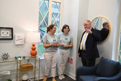 Tracy Matheson, founder of Project Beloved, and her sister, Becky Halterman, with Michael L. Marshall, VMI chief of police